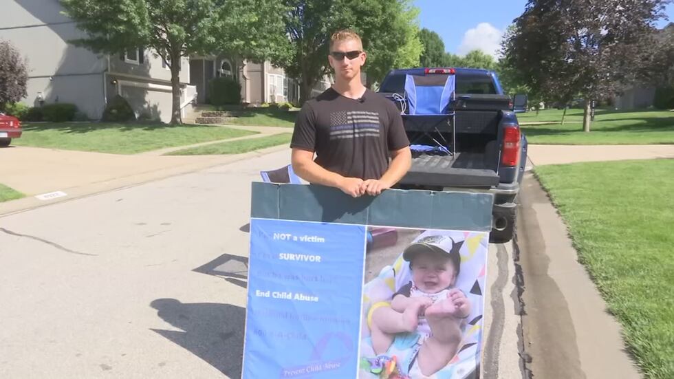 In the days following the allegations, Brett Braun stood outside Konan home with a large sign.