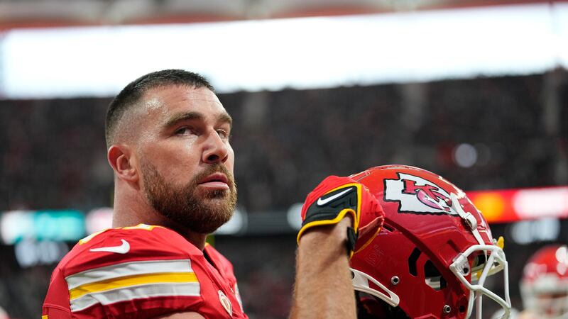 Kansas City Chiefs tight end Travis Kelce warms up before the start of an NFL football game...