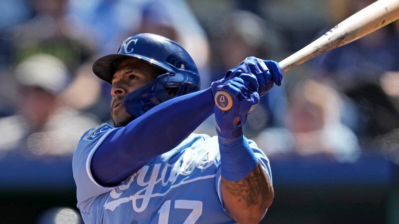 Kansas City Royals' Nelson Velazquez watches his three-run home run during the first inning of...