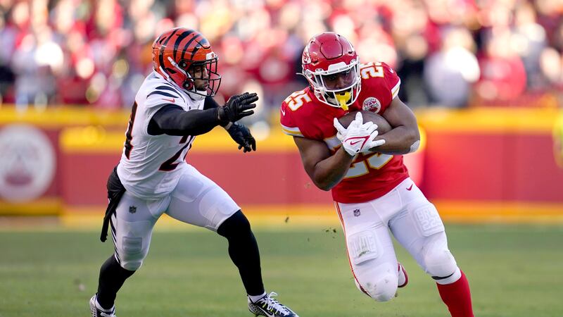Kansas City Chiefs running back Clyde Edwards-Helaire (25) carries the ball attempting to...