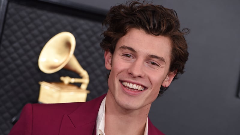 FILE - Shawn Mendes arrives at the 62nd annual Grammy Awards in Los Angeles, Jan. 26, 2020....