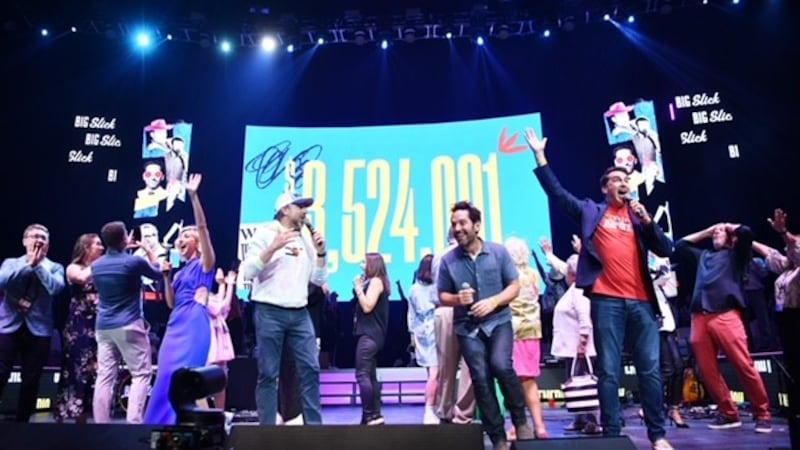Big Slick participants celebrate more than $3.5 million in money raised during the 2023 event.