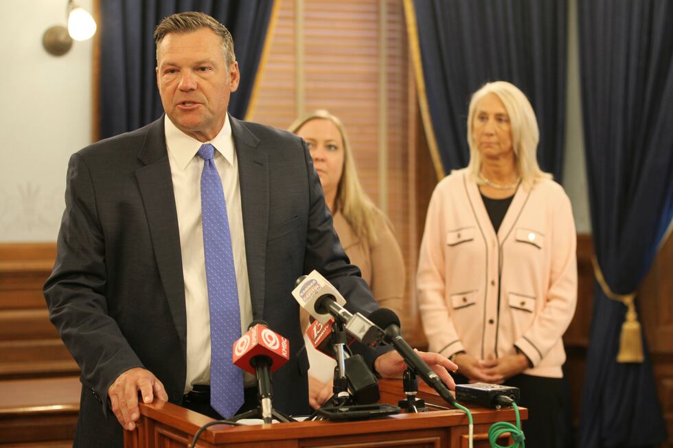Kansas Attorney General Kris Kobach speaks during a news conference during which he declares...