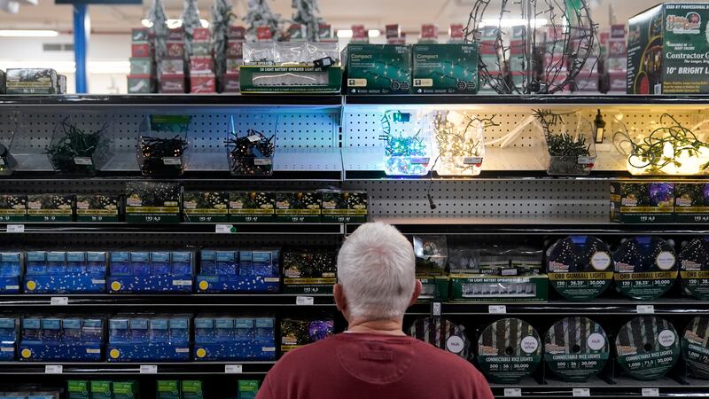 A customer browses the holiday lights section at Blackhawk Hardware, Wednesday, Nov. 1, 2023,...