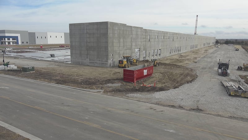 Johnson County provided pictures of VanTrust Real Estate LLC breaking ground on a new...