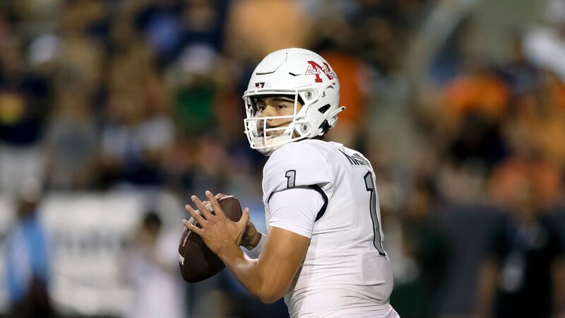 UNLV quarterback Jayden Maiava looks to throw a pass during an NCAA college football game...