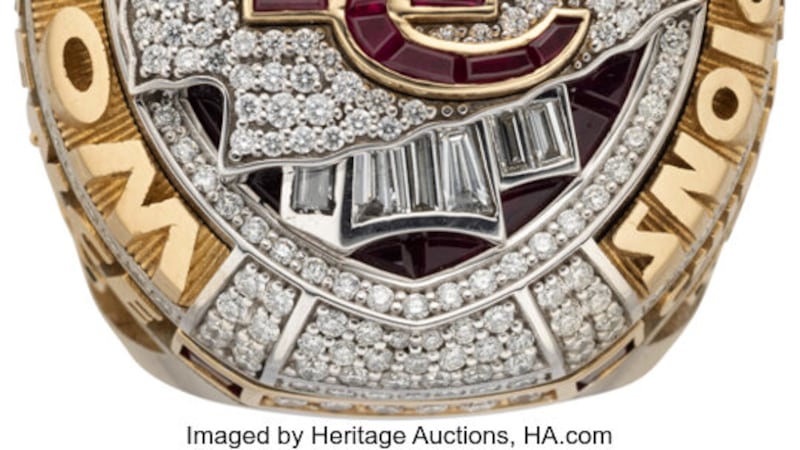 Images of defensive tackle Devaroe Lawrence's Super Bowl ring he received as a member of the...