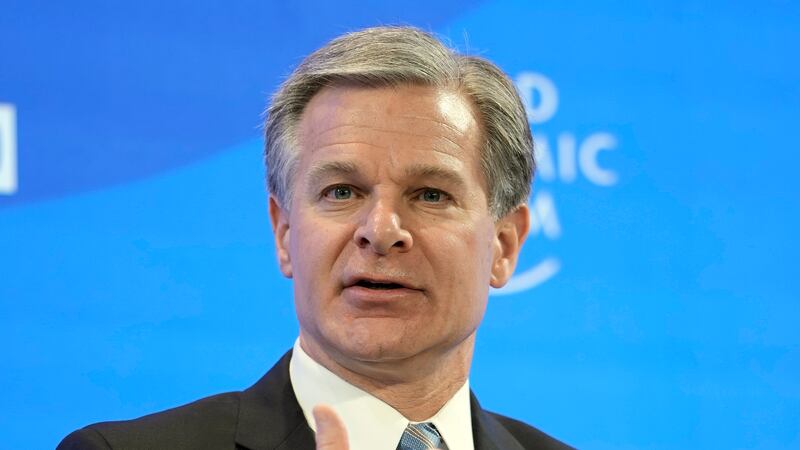FBI Director Christopher Wray talks at the World Economic Forum in Davos, Switzerland,...