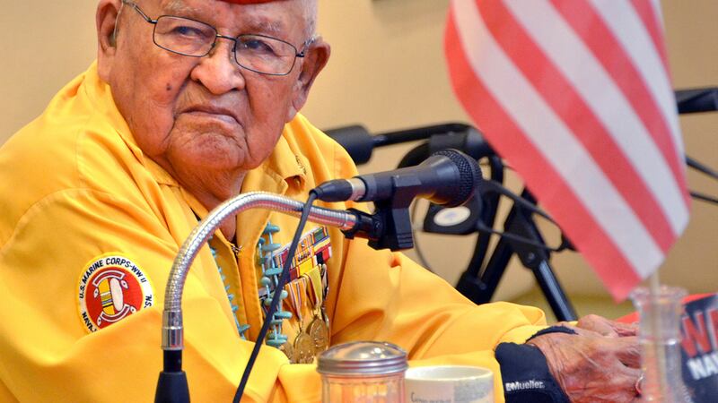 FILE - In this 2013 photo, Navajo Code Talker Samuel Sandoval talks about his experiences in...