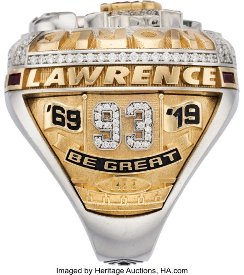 Images of defensive tackle Devaroe Lawrence's Super Bowl ring he received as a member of the...
