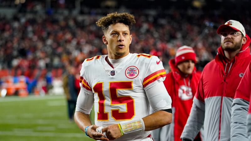 Kansas City Chiefs quarterback Patrick Mahomes (15) leaves the field following an NFL football...
