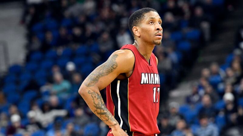 FILE - In this Feb. 6, 2017, file photo, Miami Heat's Rodney McGruder watches during a break...