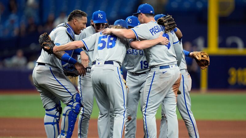 Members of the Kansas City Royals celebrate their win over the Tampa Bay Rays during a...