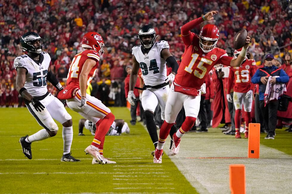Kansas City Chiefs quarterback Patrick Mahomes (15) scrambles for a first down as Philadelphia...