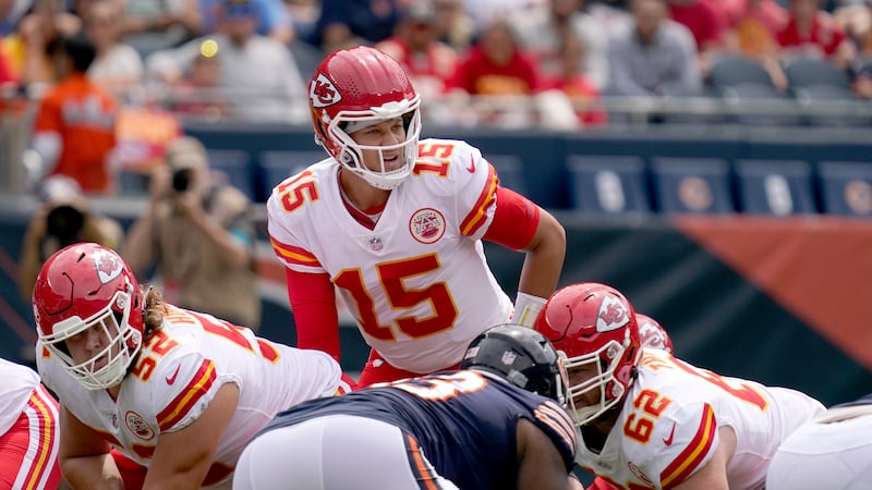 Kansas City Chiefs quarterback Patrick Mahomes looks down the line of scrimmage during the...