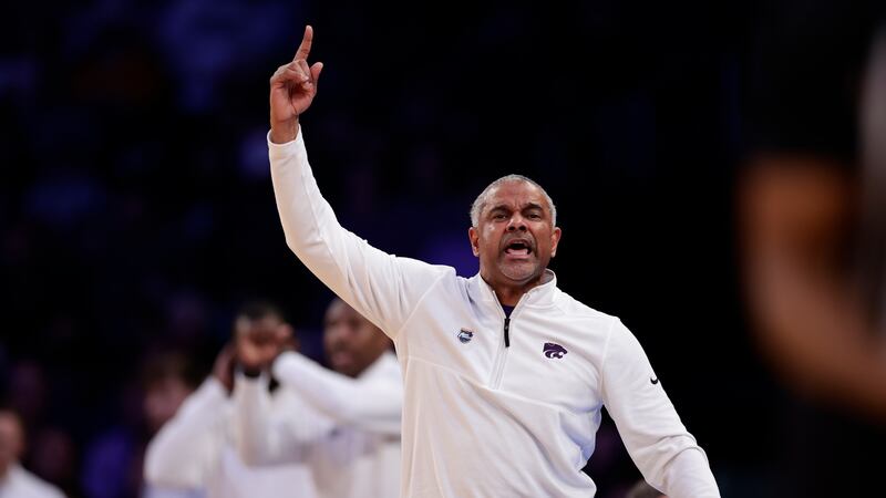 FILE: Kansas State head coach Jerome Tang signals in the second half of a Sweet 16 college...