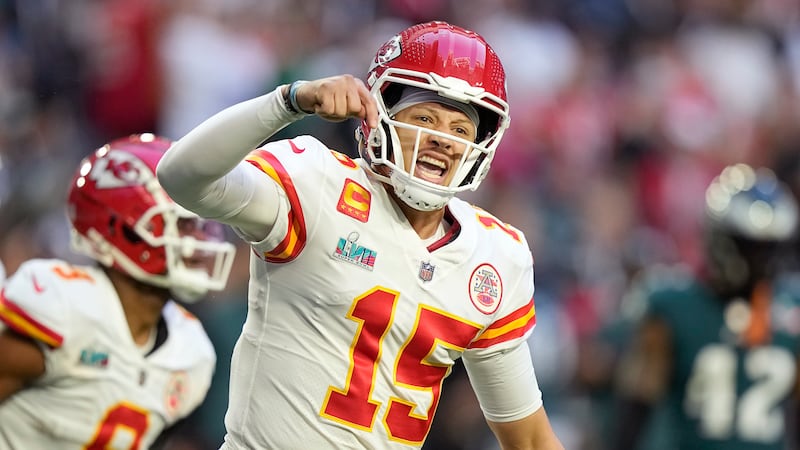 FILE: Kansas City Chiefs quarterback Patrick Mahomes (15) celebrates a touchdown against the...